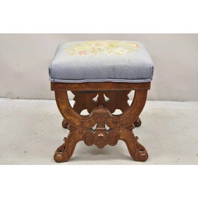 Antique Eastlake Victorian Burl Walnut Carved Curule Footstool Ottoman. Circa 19th Century. Measurements: 16" H x 16" W x...