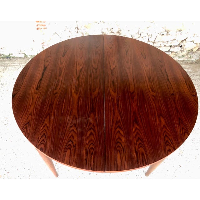 Mid-century, Vintage, round, Scandinavian-modern style dining table circa 1960's. This beautiful table is made of wood...