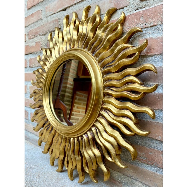 Mid 20Th French Century Sunburst Mirror in Gold. Midcentury Tiered and Gilt Sunburst Mirror from France.