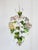 Mid-Century Italian tole painted floral motif chandelier with vibrant colors. The chandelier features clusters of flowers...