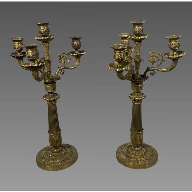 Pair of gilt bronze candelabra, 19th century, Napoleon III period, Charles X style, circa 1860. Four-light candelabra with...