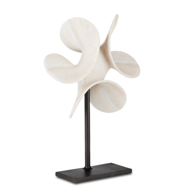 The propeller shape of the Helice Large Marble Ring will be a dynamic presence in a space; the white sculpture a feat only...