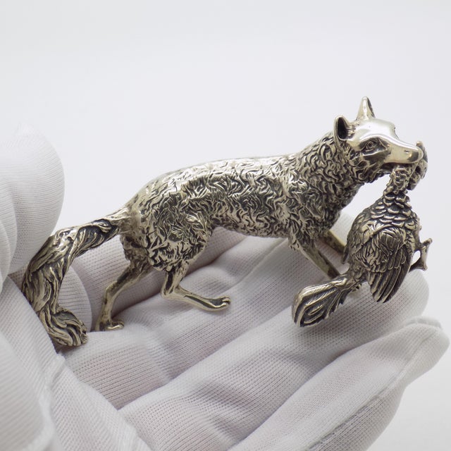 A striking vintage miniature depicting a fox carrying hunted game, handmade in Vicenza, Italy between the 1960s and 1970s...