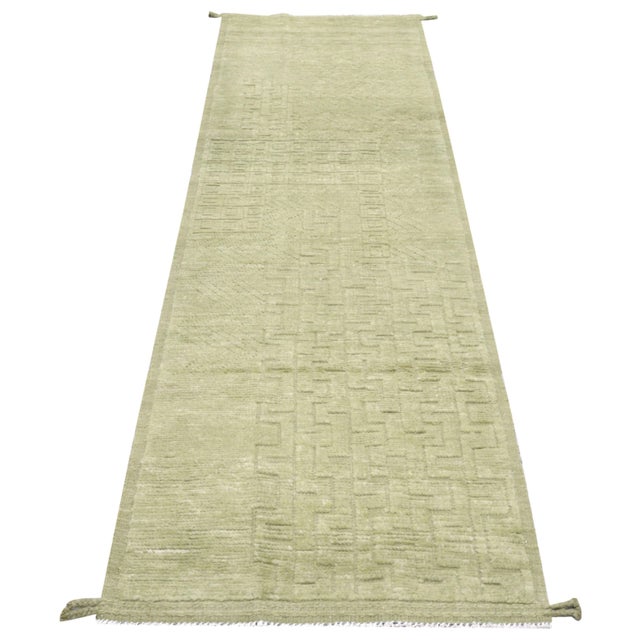 Hand-knotted with care using traditional rug making techniques, this wool rug blends timeless craftsmanship with a modern...