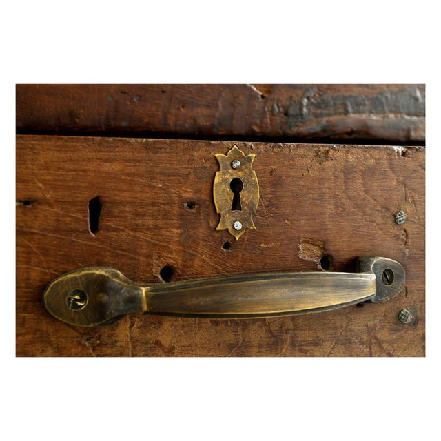Beautiful wooden table with 6 feet and 8 drawers.