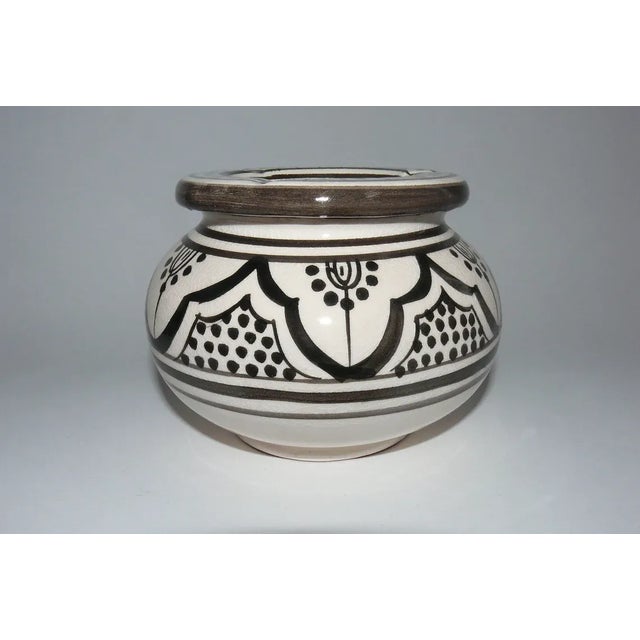 Moroccan ceramics from Moroccan pottery craft. A hand painted lidded ashtray from Morocco with traditional oriental...