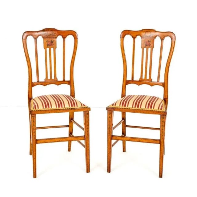Pair of Satinwood Bedroom Chairs. Circa 1890 These Rather Pretty Chairs Feature Hand Painted Decoration to the Backs and...