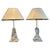 A pair of acrylic glass table lamps with brass accents and original shades. The bases in rectangular form supporting a...