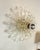This stunning wall sconce by Kate Spade works perfectly as both a sconce as well as a flush mount. This piece was released...