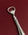 This vintage silver-plated bottle opener from the 1960s features a classic minimal design that blends timeless style with...