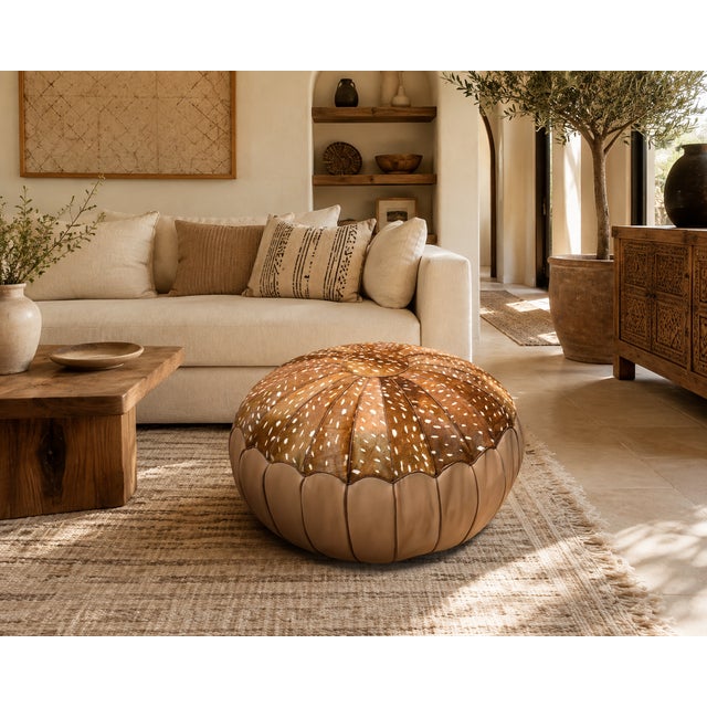 Handmade Moroccan Leather Pouf Bring timeless Moroccan craftsmanship into your home with this handcrafted round leather...