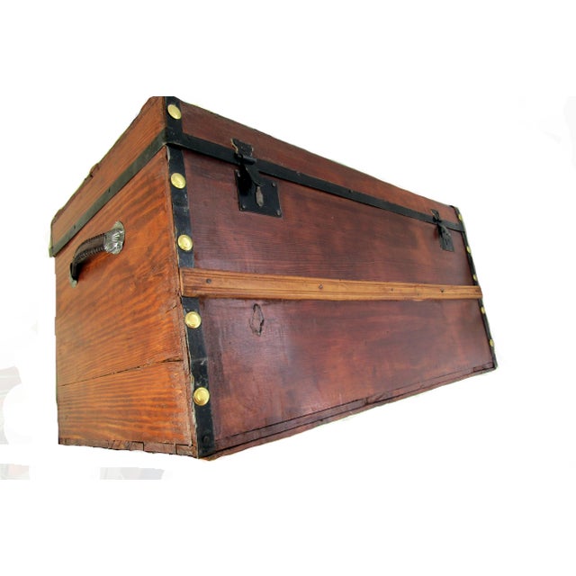 Civil War era trunk with its full pine body refinished, all original steel binding and twin front locks. Brass plated...