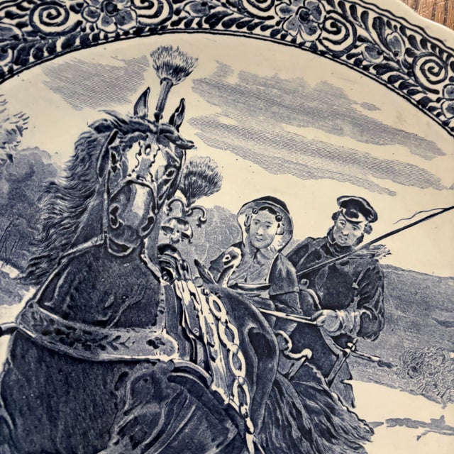 A classic blue and white delfts charger from Boch, made in Belgium. Beautiful condition with vivid colors, lightly-...