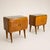 A pair of 1960s Italian Midcentury Modern bedside tables, crafted from birch with brass accents and a glass top. The...
