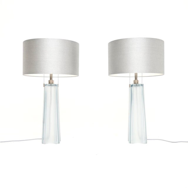 A stunning and extremely well made pair of Italian Murano glass Quatrefoil table lamps by Donghia. They were made in Italy...