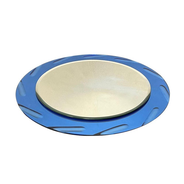 Vintage Wall Mirror by Cristal Art, Italy 1970s. Blue mirrored glass frame 70x2x70cm. Very good condition. This piece is...