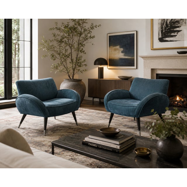 Pair of Italian Mid-Century Modern Sculptural Lounge Chairs, in the Style of Gio Ponti, circa 1950s Dimensions: 34 in. W ×...