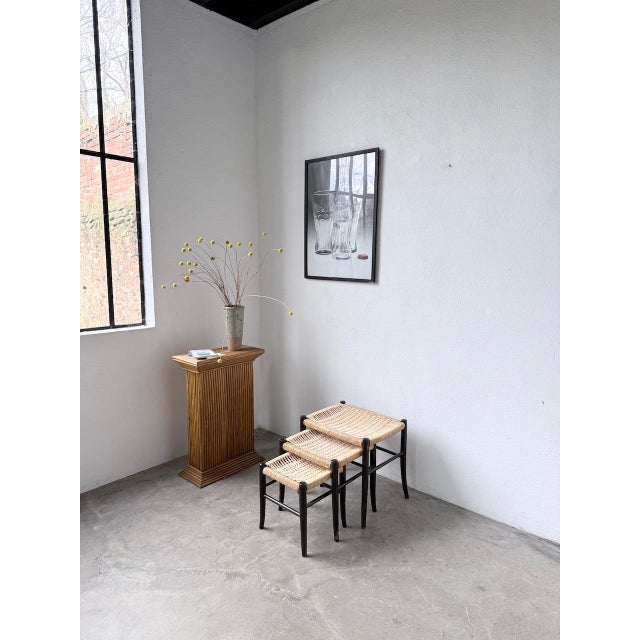 A set of three nesting stools (or possibly three small side tables), attributed to spinetto chiavari, italy. they feature...