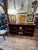 Handsome walnut mid century modern horizontal console and bookcase having multiple sections for books and display/...