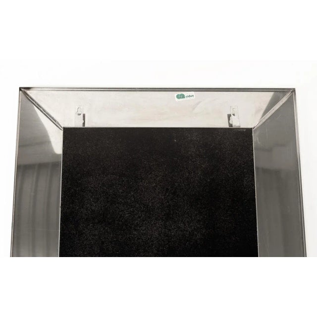 Chrome mirror designed by Cidue. Circa 1970 Italy. Square chrome frame with square mirror. Signed 'Made in Italy, Cidue...