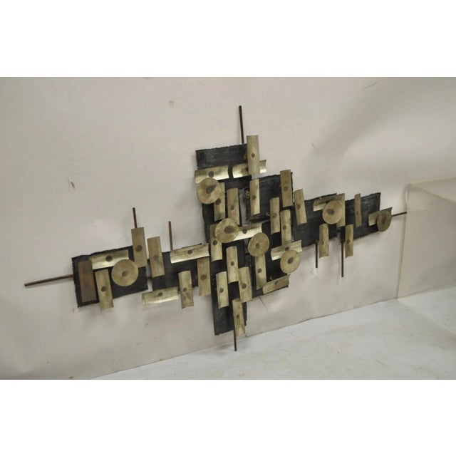 Vintage Mid Century Modern Brutalist Steel Metal 48" Wall Sculpture after Curtis Jere. Item features brutalist design,...