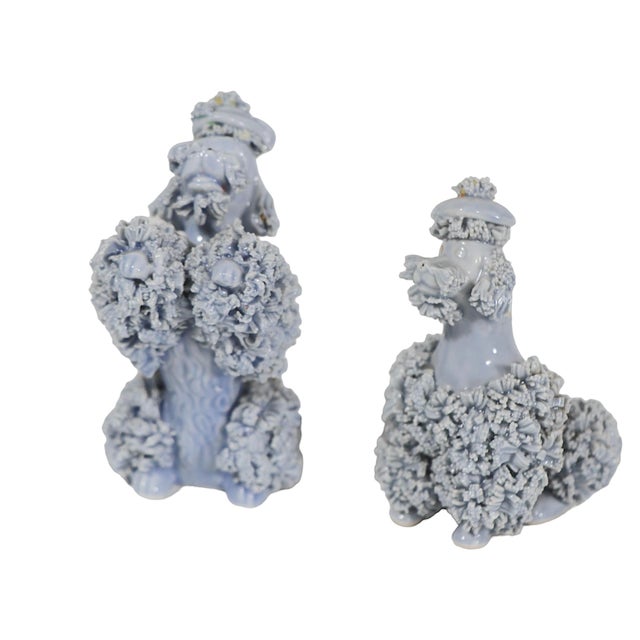 Two powder blue mid century spaghetti china poodle dogs, both in excellent original, undamaged condition. Circa 1950's,...