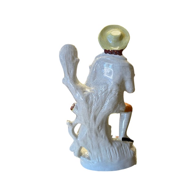 Large Staffordshire Spill Vase of Man in Orange Pants and Yellow Hat, Holding Wheat and Scythe with a Lamb at his Feet....