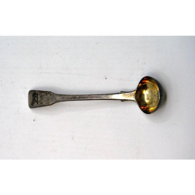 Silver Sugar Spoon with Animal Figure Engraved, in Very Good conditions. Designed 1890 to 1919 This piece has an...