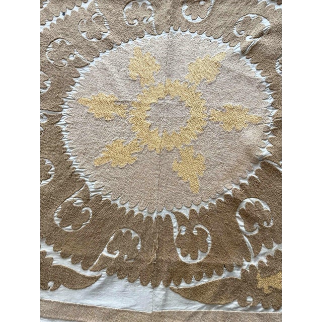 Vintage Embroidered Suzani from Uzbek, circa 1960s. There are stains on this suzani. Dimension; 57'' x 60'' inches / 145 x...