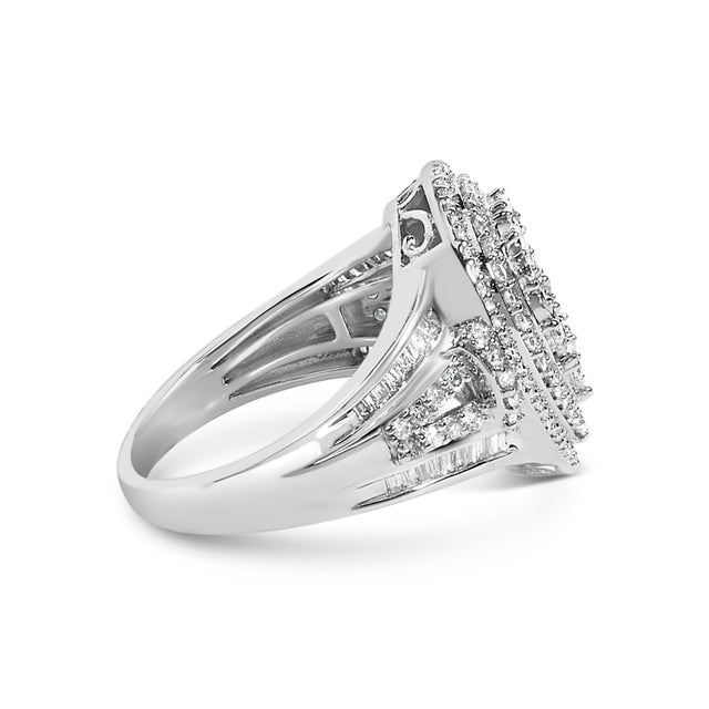Unveil the epitome of elegance with this pear-shaped sterling silver ring, embellished with a mesmerizing triple halo...