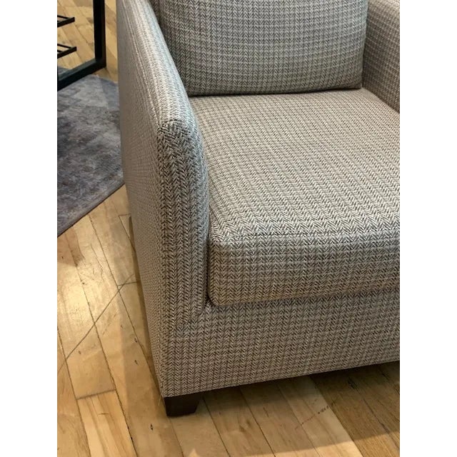 The Lewis chair from Stewart Furniture is a comfortable, tailored chair. It is covered in a hounds tooth pattern fabric in...
