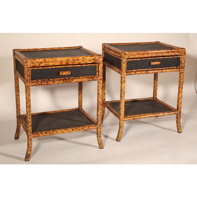 Pair of aesthetic movement style rattan, metal and canvas side tables, late 20th century. With an inset canvas top with...