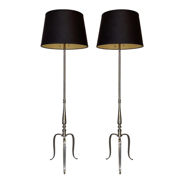 Pair of French Mid-Century Polished Nickel Tripod Floor Lamps For Sale