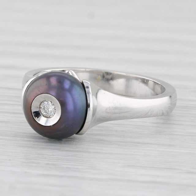 Gemstone Information: - Cultured Pearl - Size - 8.3 mm Cut - Round Bead Shape Color - Black Treatment - Dyeing - Natural...