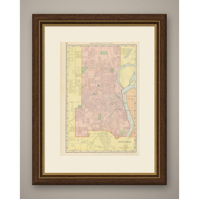 An antique map of Omaha, Nebraska, published by Rand McNally in 1899 on page 304 of its indexed atlas, this street plan...