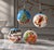 Set of Four Large Hand-Painted Glass Christmas Ornaments, Central Europe, c. 1950s Set of four large Christmas ornaments,...