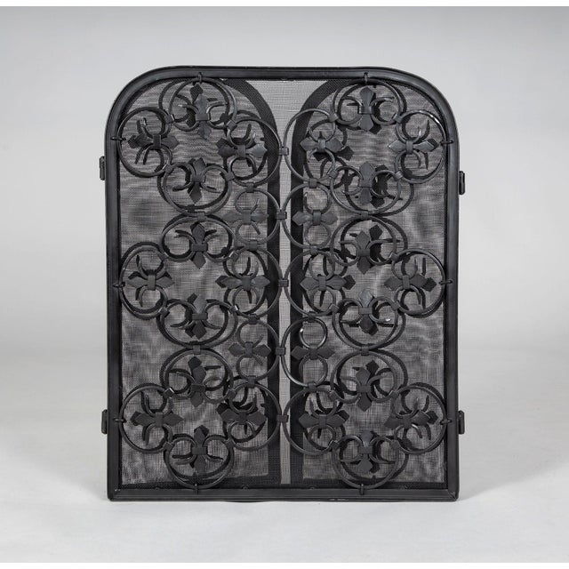 American Vintage heavy, sturdy wrought iron 3-panel folding fireplace screen decorated with Gothic style quatrefoils...