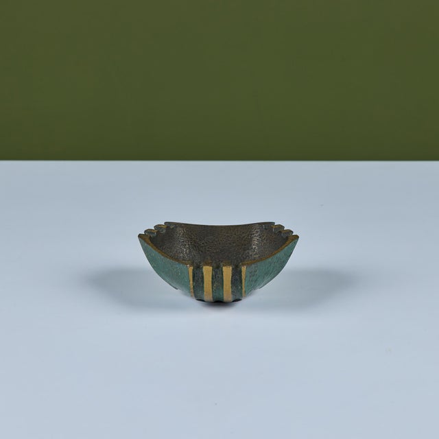Brass Israeli bowl from the Dayagi brothers. Features a triangular form with three ribbed sides and a hand-hammered...