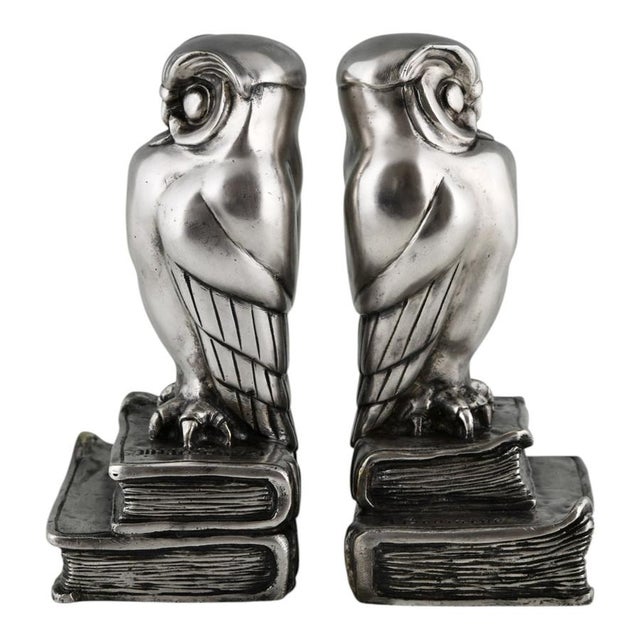Art deco bronze owl bookends “philosophie” – marcel bouraine, 1925 a rare and refined pair of art deco bronze bookends...