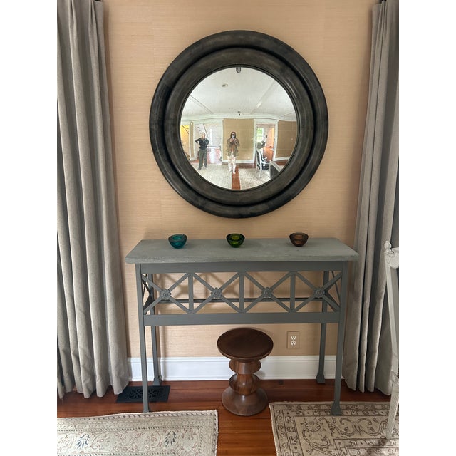 Very large striking round mirror having convex mirror surrounded by chunky grey wood or faux shagreen frame in classic...