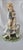 The Royal Doulton The Goose Girl HN2419 figurine ornament is a beautifully crafted porcelain piece from the renowned brand...
