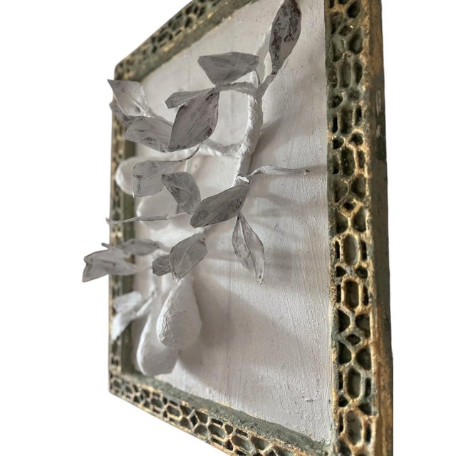 One of a kind hanging wall sculpture, featuring a handcrafted Papier Mache pear branch adorned with Venetian plaster...
