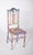 Painted dining chair with eye. With a vertical backrest decorated with a carved medallion, transformed by a contemporary...