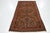 This beautiful malayer wool rug has a brown field with multicolor accents and tribal motif. This rug measures 3'6'' x 6'6''.