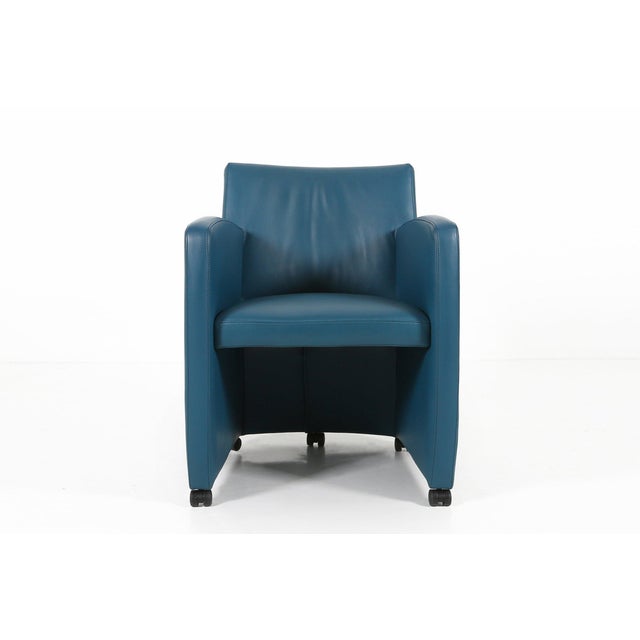 Arm chair in blue leather on castors made by Leolux, The Netherlands. Leolux has been known for years for design furniture...