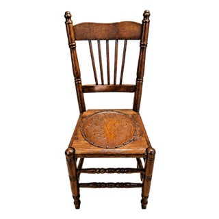 Early 20th Century Oak Spindle Back Side Chair With Embossed Heraldic Medallion Seat For Sale