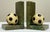 Pair of vintage Italian soccer ball motif bookends. Each bookend features a detailed ivory and black stone soccer ball on...