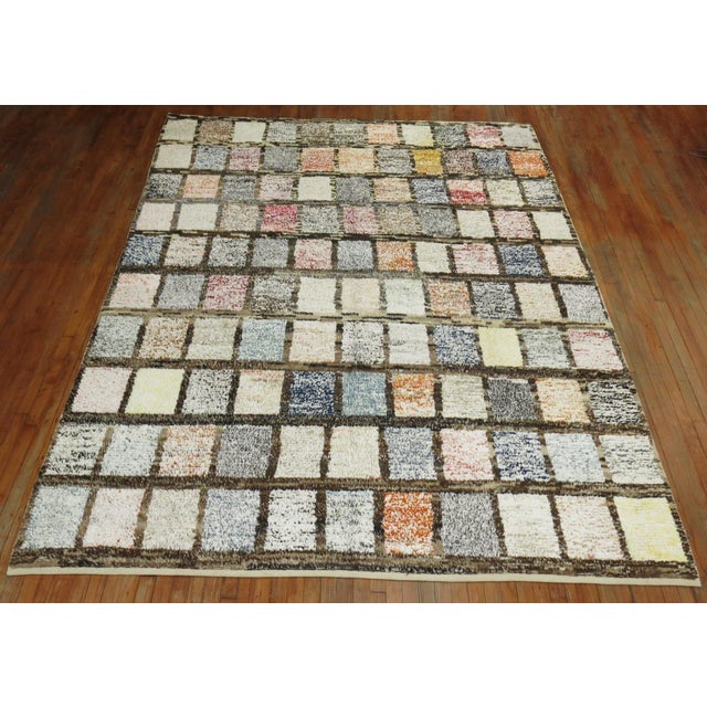 An awesome old wool one of a kind Turkish Tulu with a colorful repetitive box design in array of different colors. The...