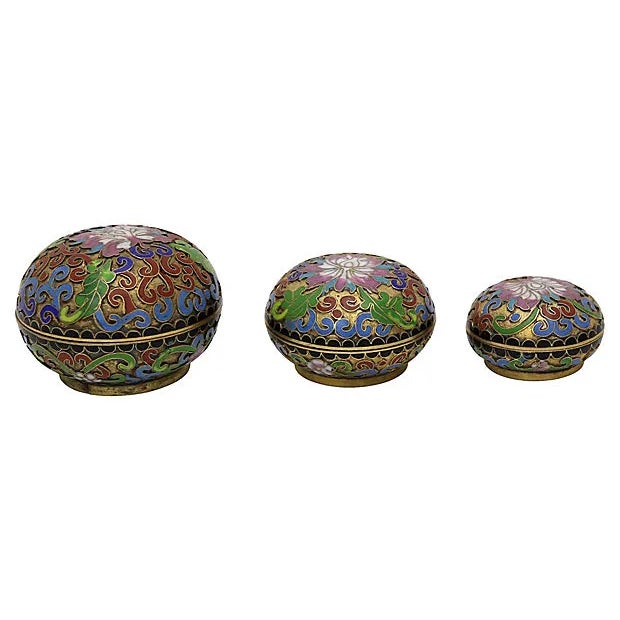 Set of three cloisonné trinket boxes. Vibrant colors with turquoise interior. They are nesting, stacking one inside the...