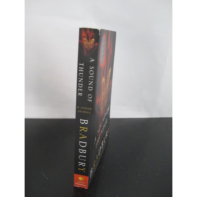 First edition copy of Ray Bradbury's 2005 Harpers Perennial Publication of 'A Sound of Thunder'. Hand signed inner page....